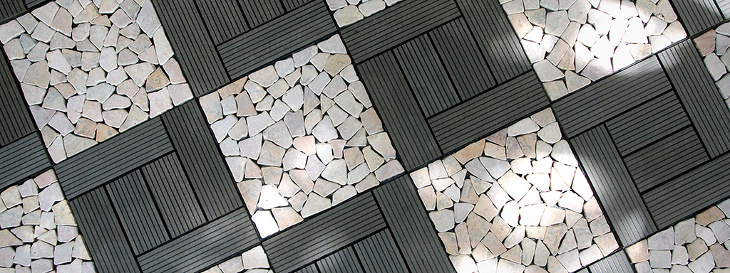 Some of our garden tiles installed, the click tiles used here are Rustic Grey WPC and Mosaic Stone.